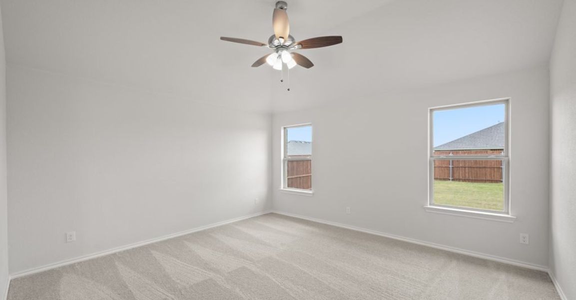 Representative exterior photo of a completed home built from the Lincoln by Impression Homes in Baker Farms, Cleburne, TX (Image 13).