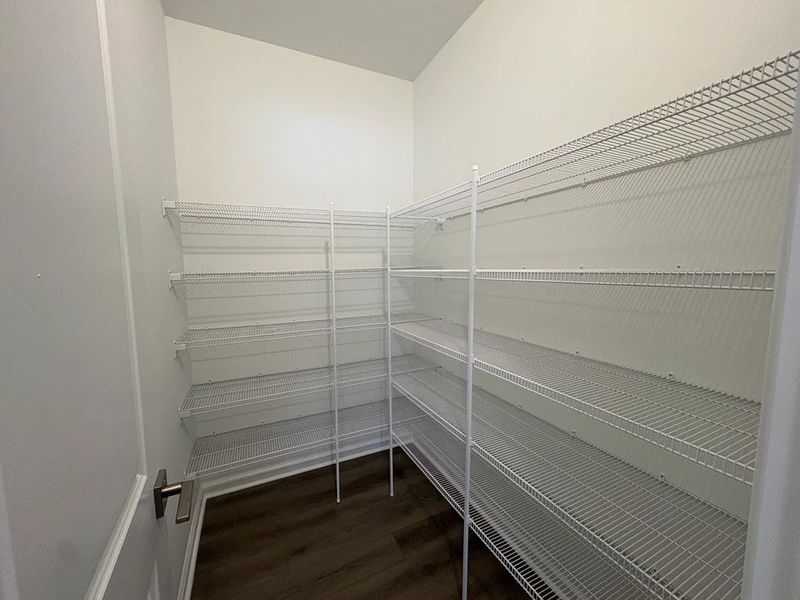 Pantry featuring the AW Collection® Timeless - Classic storage with polished finishes.