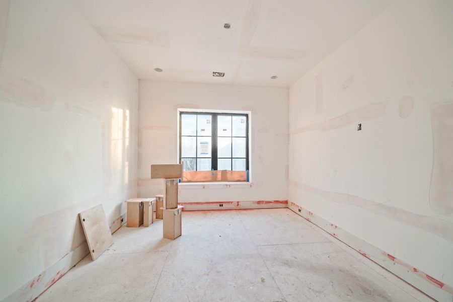 The final upstairs bedroom is tucked over the study, with a view of the front lawn!