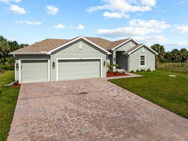 Front exterior of a new home in Port Charlotte, Port Charlotte, FL, highlighting curb appeal (Image 27).