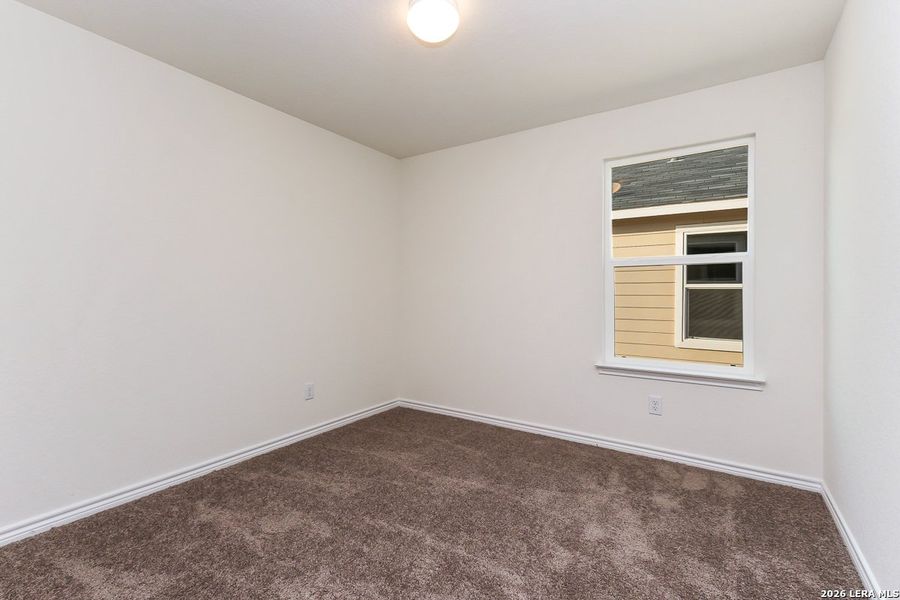 Spacious, unfurnished interior of a new home in Preserve at Culebra - Classic Collection, San Antonio (Image 10).