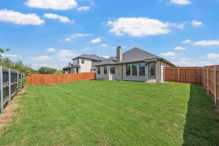 Front exterior of a new home in Renaissance, Waco, TX, highlighting curb appeal (Image 18).