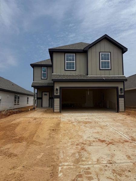 In-progress construction of a new home in River's Edge, Conroe, TX (Image 26).