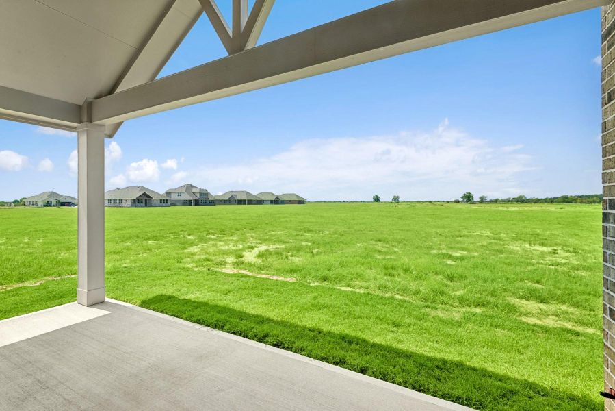 Stunning views of the backyard from the patio Stunning views of the backyard from the patio