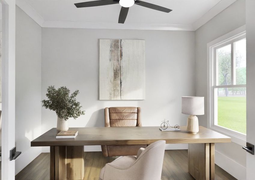 A home office featuring a desk, chair, and a ceiling fan, creating a comfortable workspace environment.