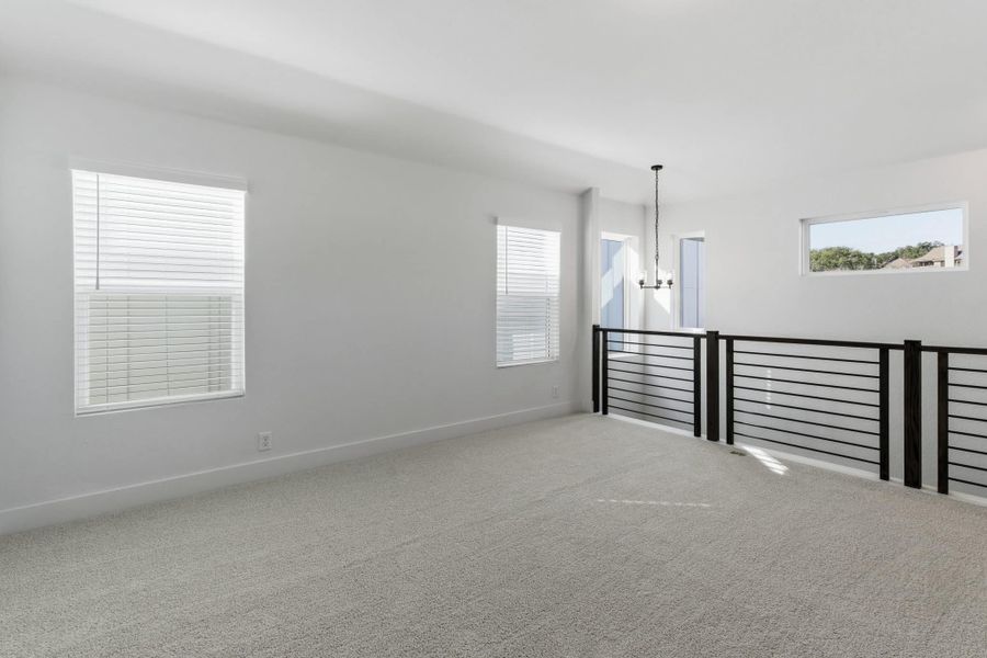 Spacious, unfurnished interior of a new home in Centero at Stone Oak, San Antonio (Image 27).