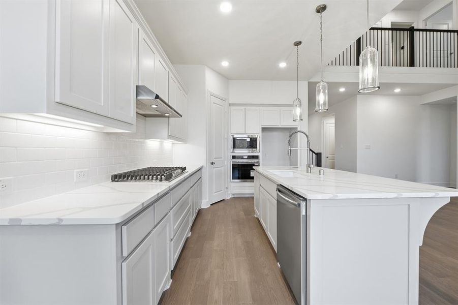 Furnished interior view inside a new home in Wildridge, Oak Point (Image 7).
