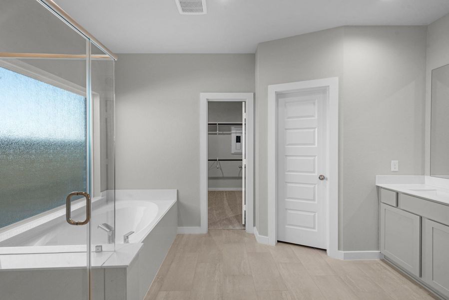 Furnished interior view inside a new home in Sunterra Lakes, Brookshire (Image 10).