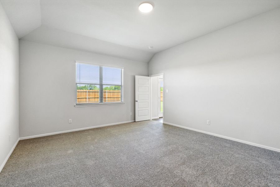 Primary Suite in the Sapphire home plan by Trophy Signature Homes – REPRESENTATIVE PHOTO