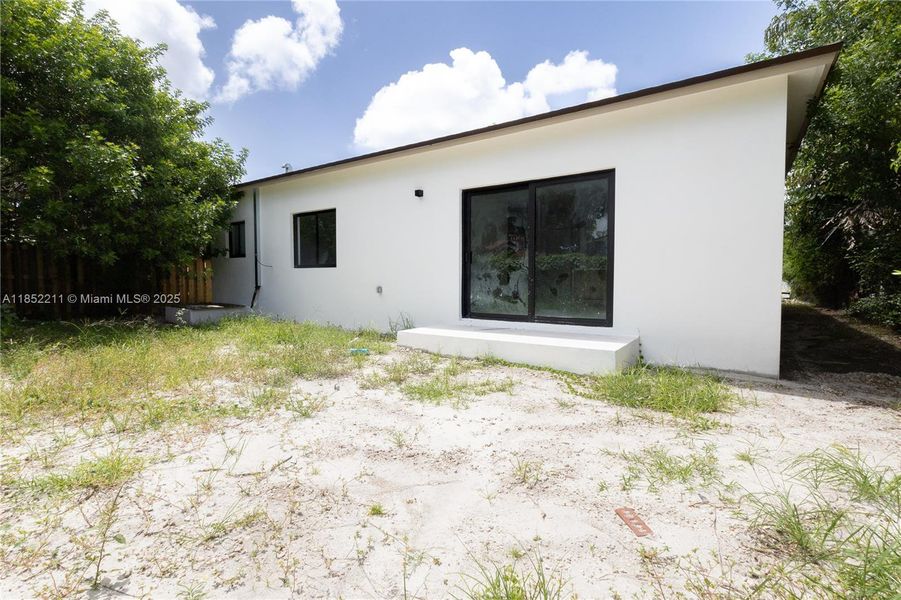 Exterior details and patio area of a home in , Miami (Image 3). Exterior details and patio area of a home in , Miami (Image 3).