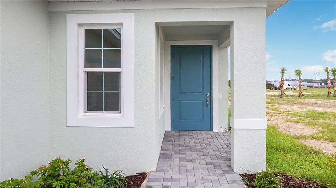 Exterior details and patio area of a home in Cresswind at Hammock Oaks, Lady Lake (Image 30).