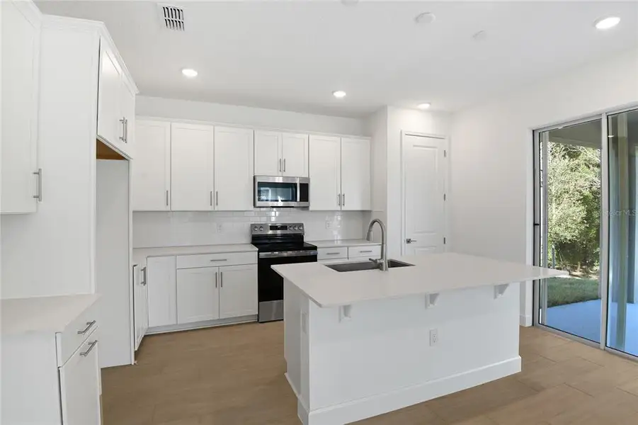 Furnished interior view inside a new home in Seasons at Wekiva Ridge, Mount Dora (Image 5).