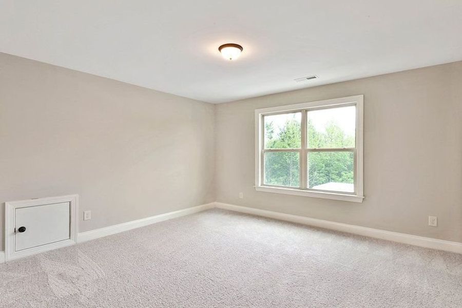 Representative unfurnished interior of a home built from the Grovetown by Dustin Shaw Homes in Durham Estates, Sharpsburg (Image 23).