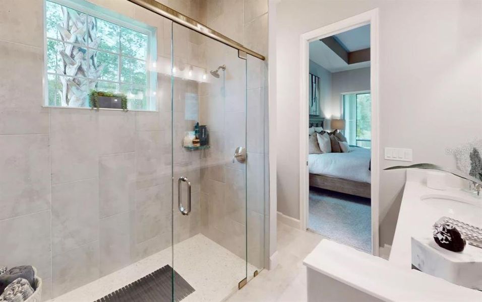 Furnished interior view inside a new home in Plantation Bay, Ormond Beach (Image 13).