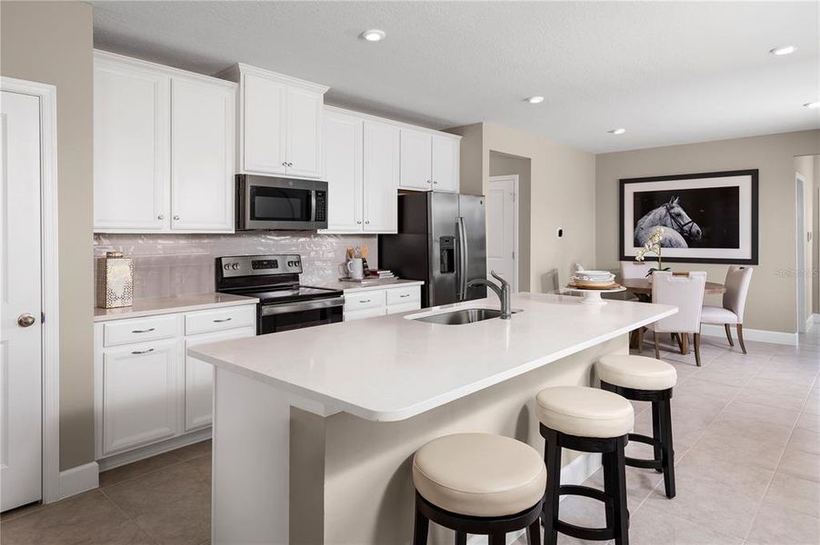 Furnished interior view inside a new home in Reserve at Lake Meadows, Ocoee (Image 8). Furnished interior view inside a new home in Reserve at Lake Meadows, Ocoee (Image 8).