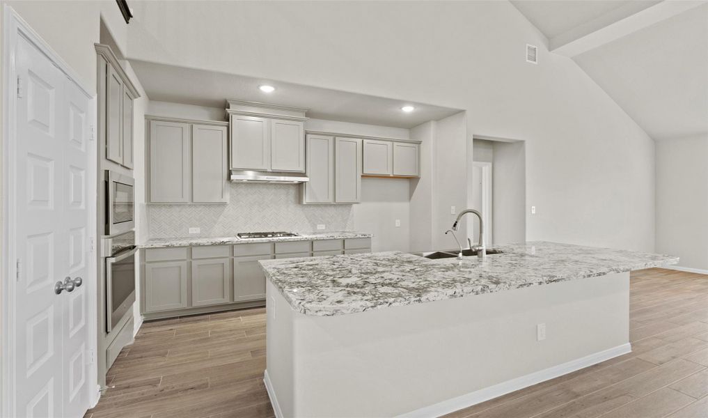 Stunning island kitchen (*Photo not of actual home and used for illustration purposes only.) Stunning island kitchen (*Photo not of actual home and used for illustration purposes only.)