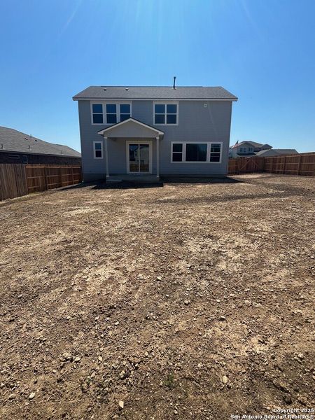 Front exterior of a new home in Skybrooke, San Antonio, TX, highlighting curb appeal (Image 2).