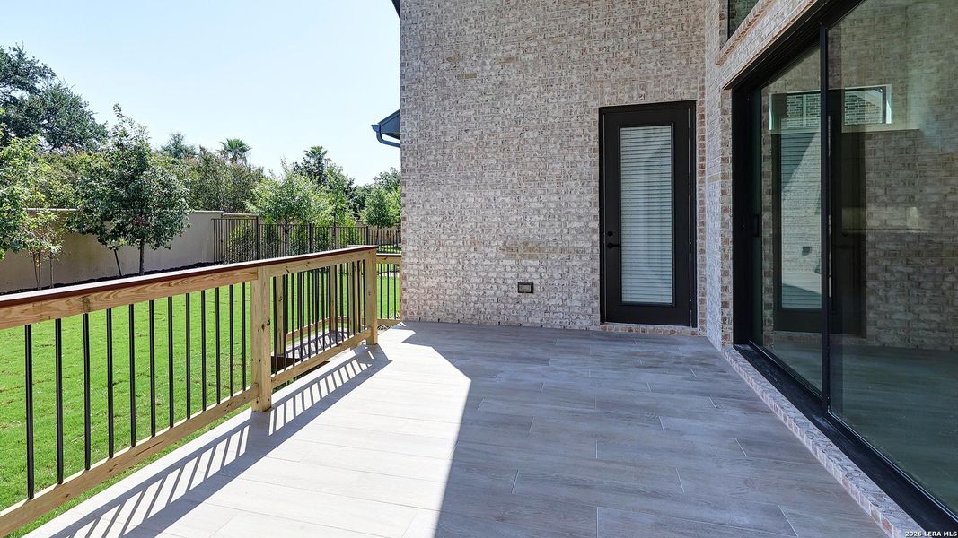 Exterior details and patio area of a home in The Dominion, San Antonio (Image 3).