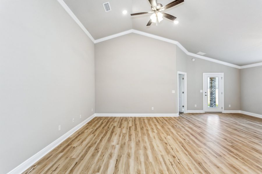 Representative unfurnished interior of a home built from the The Carlos by Herbst Homes in Doyle Hawkins Landing, Navarre (Image 22).