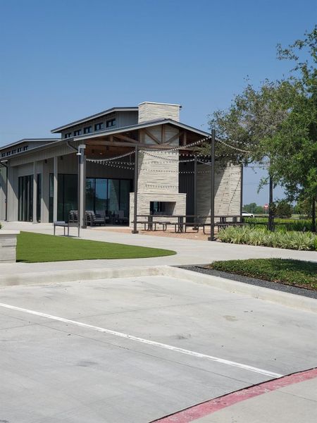 Front exterior of a new home in Candela 50', Richmond, TX, highlighting curb appeal (Image 1).