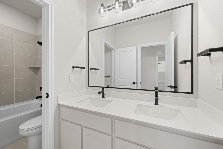Furnished interior view inside a new home in Meadow Park at The Meadows, Ponder (Image 13).