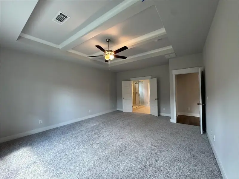Spacious, unfurnished interior of a new home in Rosewood Lake Preserve, Hoschton (Image 32).