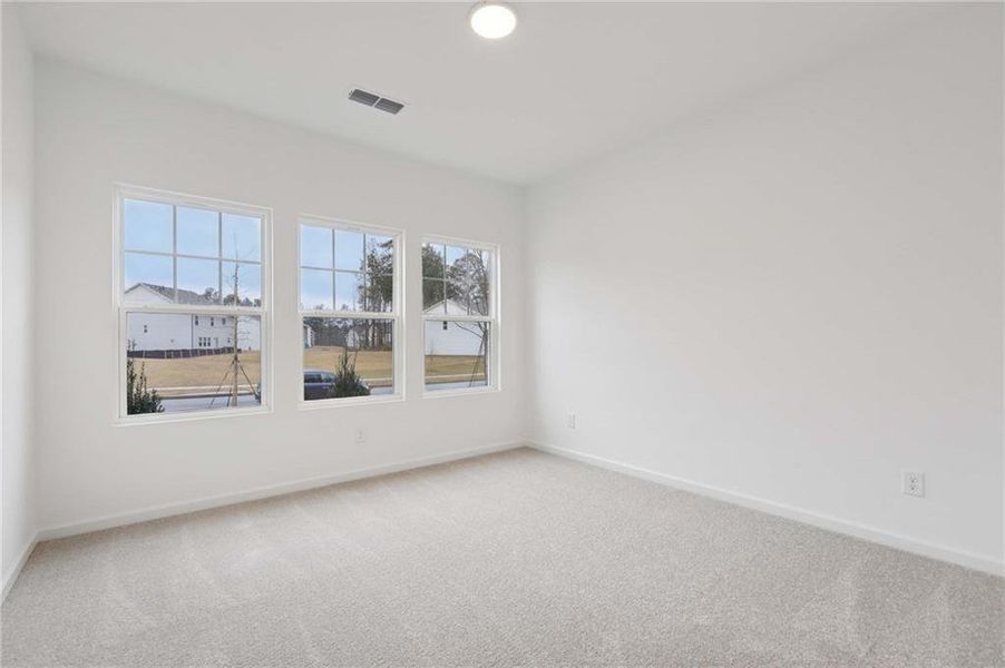 Spacious, unfurnished interior of a new home in The Pointe at Heron Bay, Locust Grove (Image 11).