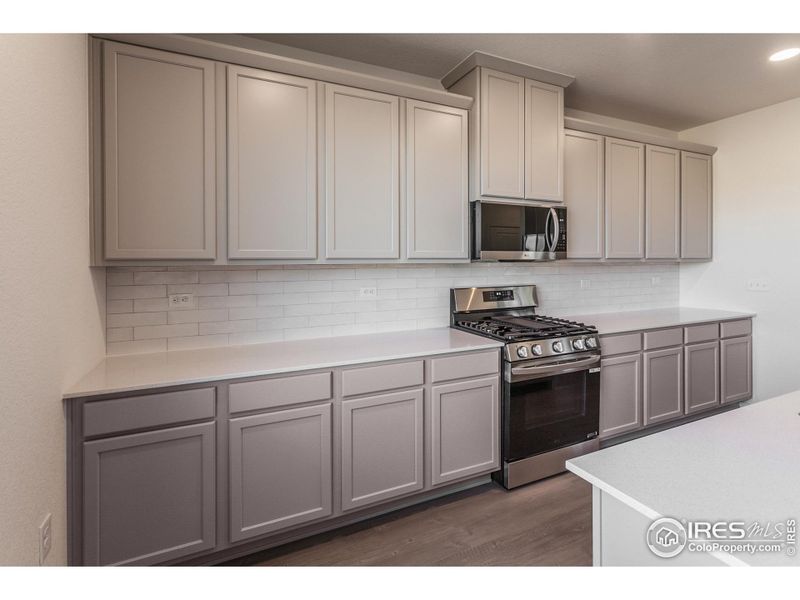 Furnished interior view inside a new home in Bloom Trailblazer Collection - Single Family Homes, Fort Collins (Image 9).