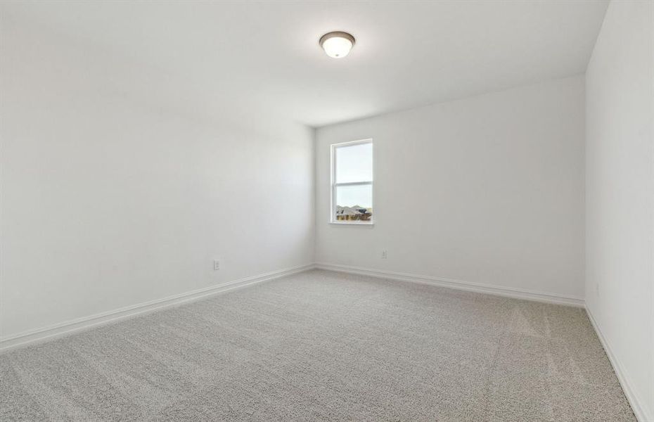 Spacious secondary bedroom with ample closet space Spacious secondary bedroom with ample closet space