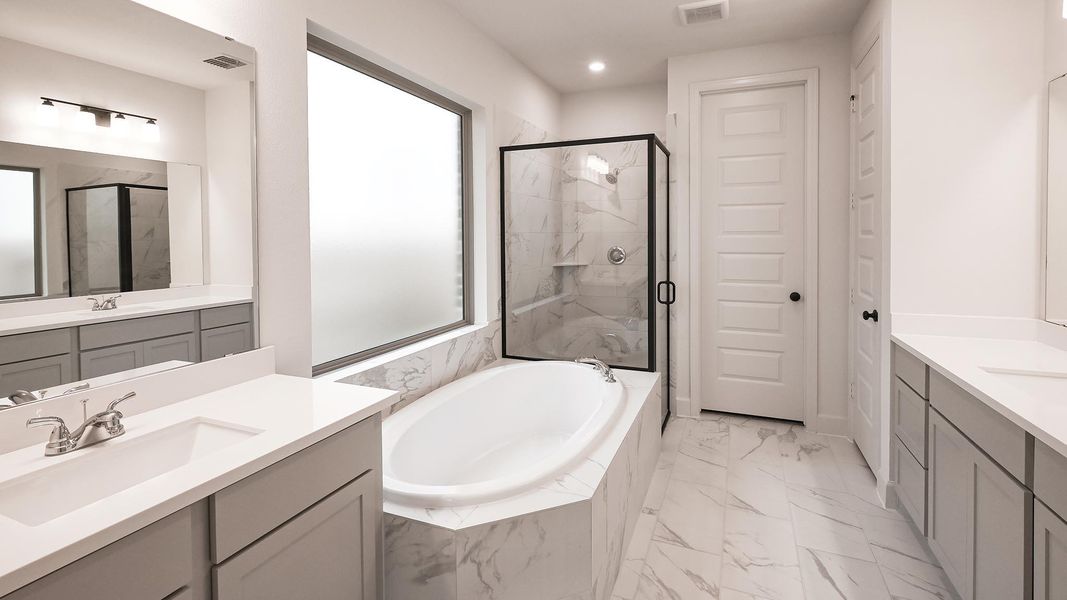 Furnished interior view inside a new home in 6 Creeks, Kyle (Image 7).