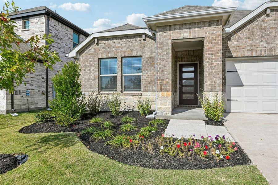 Exterior details and patio area of a home in Lakehaven - Signature Series, Farmersville (Image 2). Exterior details and patio area of a home in Lakehaven - Signature Series, Farmersville (Image 2).