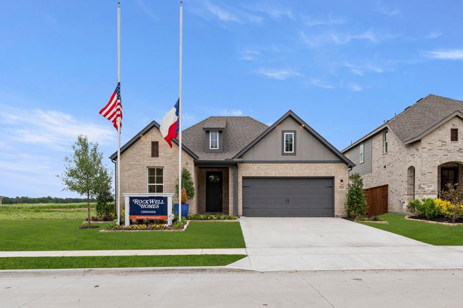 Representative exterior photo of a completed home built from the Patriot by Rockwell Homes in Creekside, Royse City, TX (Image 1). Representative exterior photo of a completed home built from the Patriot by Rockwell Homes in Creekside, Royse City, TX (Image 1).