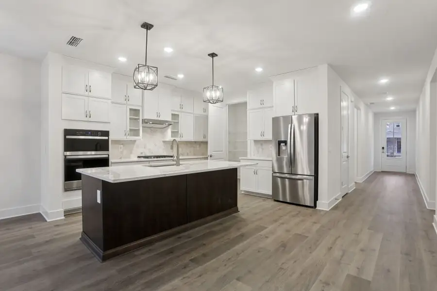 Furnished interior view inside a new home in Station Hill - Reserve Series, Franklin (Image 5).