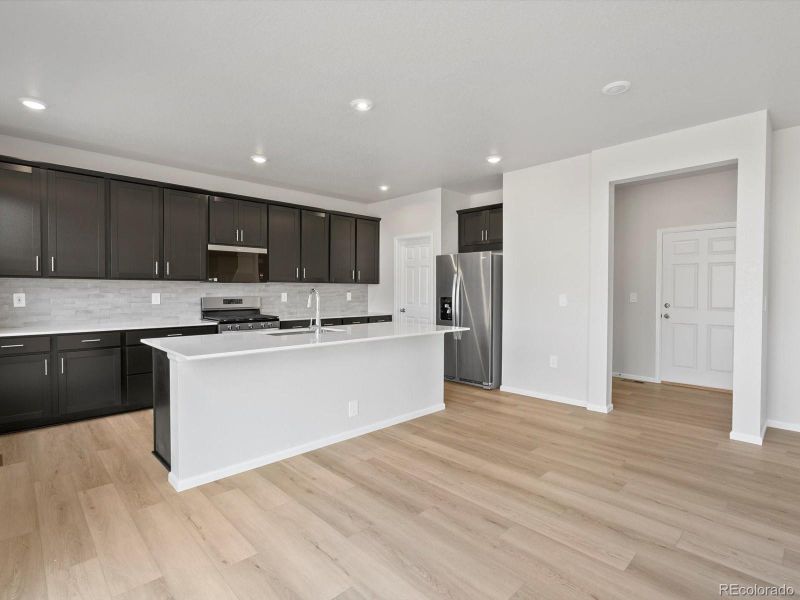 Furnished interior view inside a new home in Poudre Heights: The Alpine Collection, Windsor (Image 8).