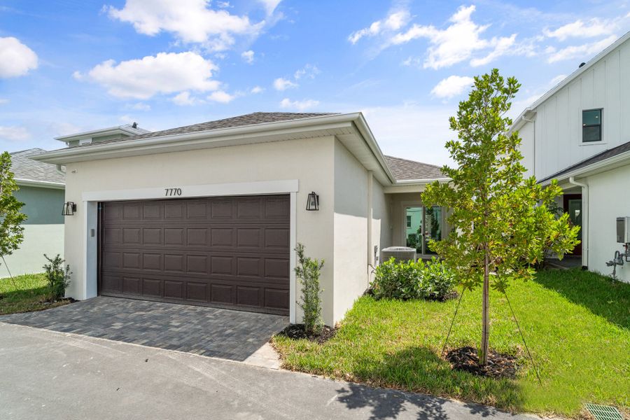 Representative exterior photo of a completed home built from the Monarch by Mattamy Homes in Newfield - Rosette Park, Palm City, FL (Image 14).