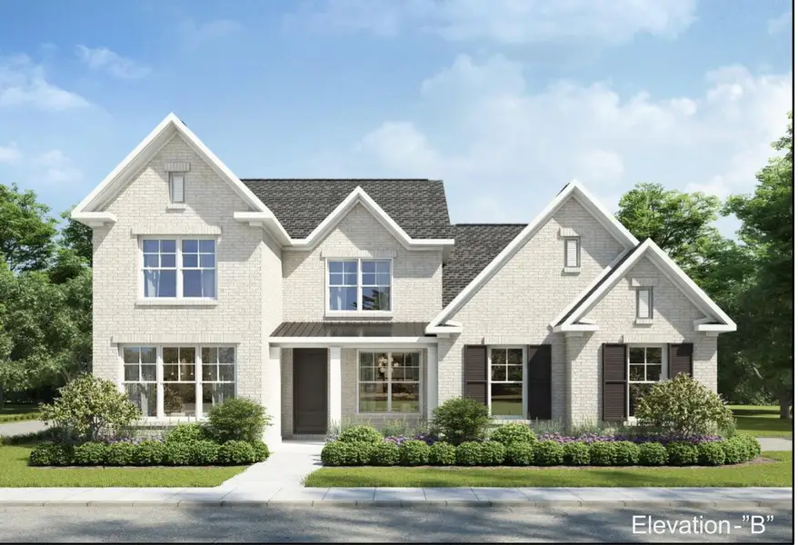 Traditional-style residence featuring a light brick exterior, dark asphalt shingle roof, multiple gables, dark window shutters, and a covered entry Traditional-style residence featuring a light brick exterior, dark asphalt shingle roof, multiple gables, dark window shutters, and a covered entry