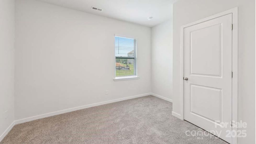 Spacious, unfurnished interior of a new home in Cardinal Creek, Charlotte (Image 20).