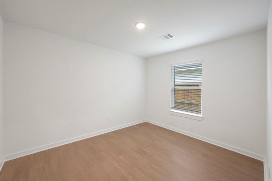 Spacious, unfurnished interior of a new home in Lone Star Landing, Montgomery (Image 16).