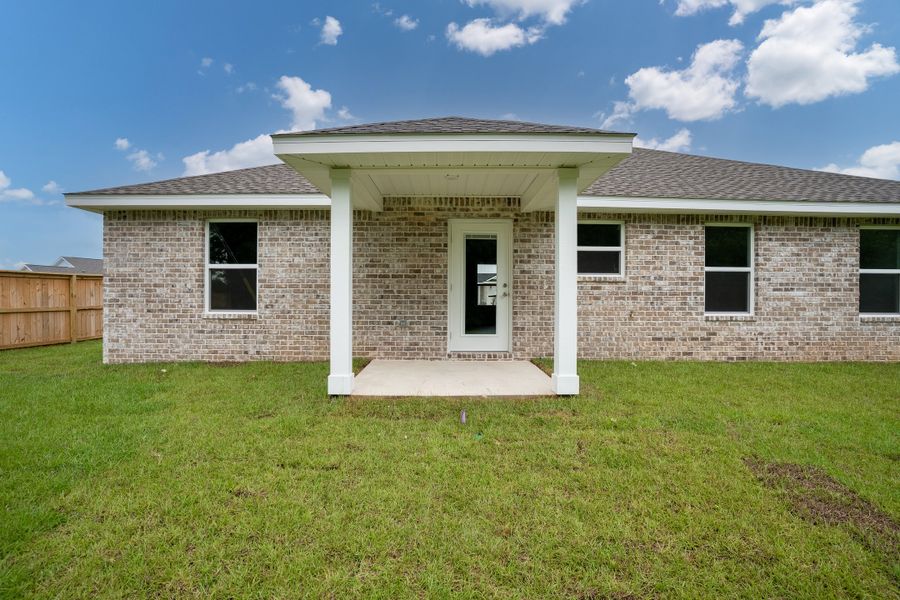 Exterior details and patio area of a home in Southern Charm, Crestview (Image 2). Exterior details and patio area of a home in Southern Charm, Crestview (Image 2).