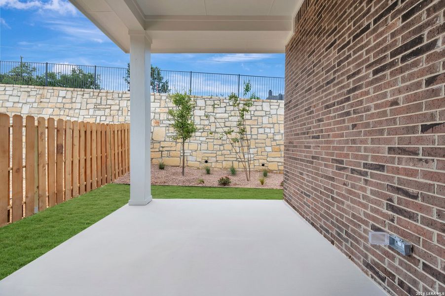 Exterior details and patio area of a home in Windsong - Legacy Series, Boerne (Image 26).