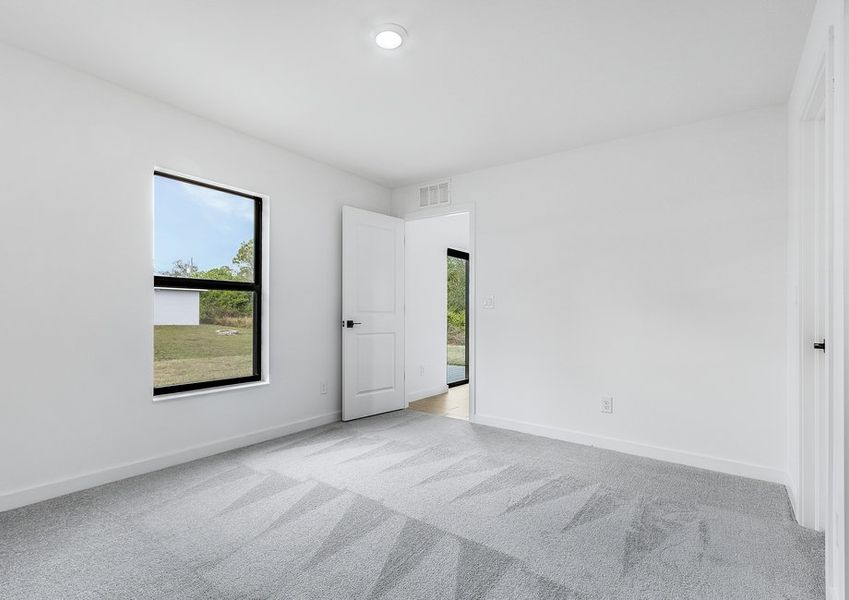 Rest and relaxation await in the master bedroom