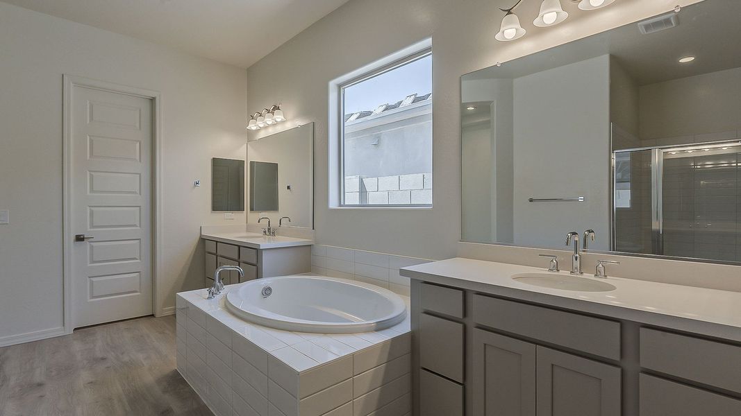Furnished interior view inside a new home in Windrose, Waddell (Image 31).