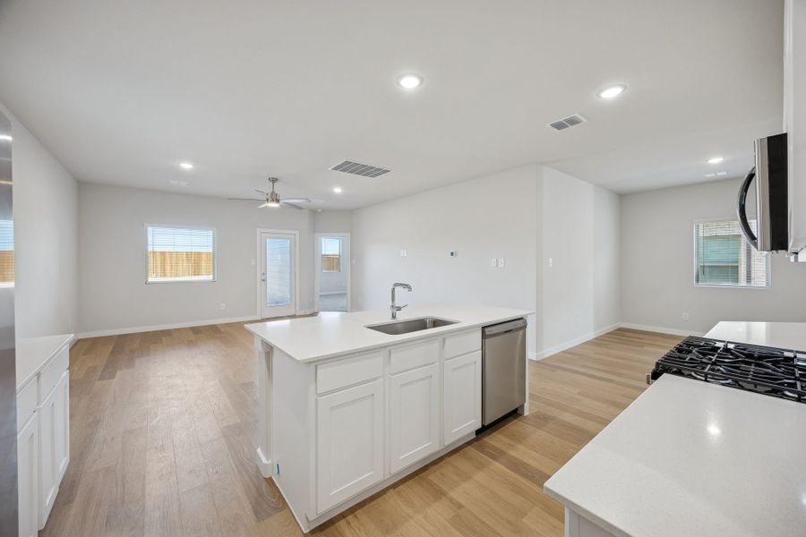 Open Floor Plan in the Oak II home plan by Trophy Signature Homes – REPRESENTATIVE PHOTO