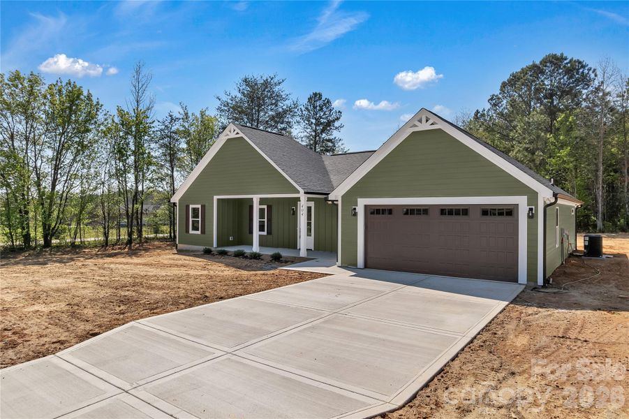 Front exterior of a new home in , Cherryville, NC, highlighting curb appeal (Image 2).