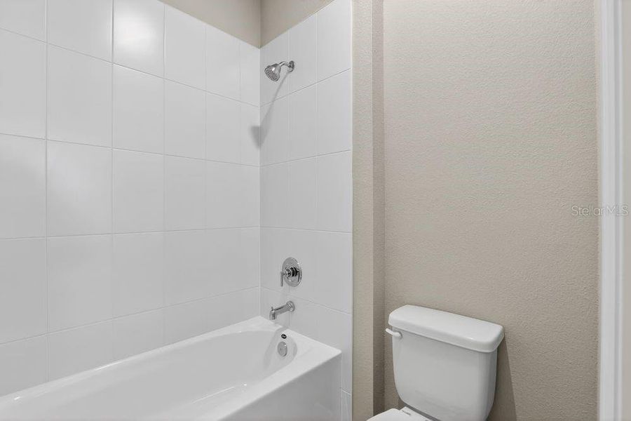 Furnished interior view inside a new home in Ardisia Park, New Smyrna Beach (Image 18).