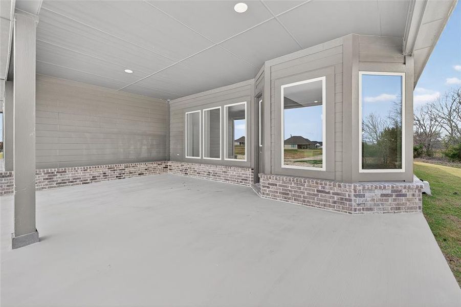Exterior details and patio area of a home in Nash Estates, Tom Bean (Image 3).