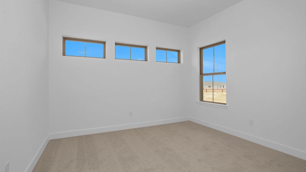 Spacious, unfurnished interior of a new home in Elyson 55', Katy (Image 6).