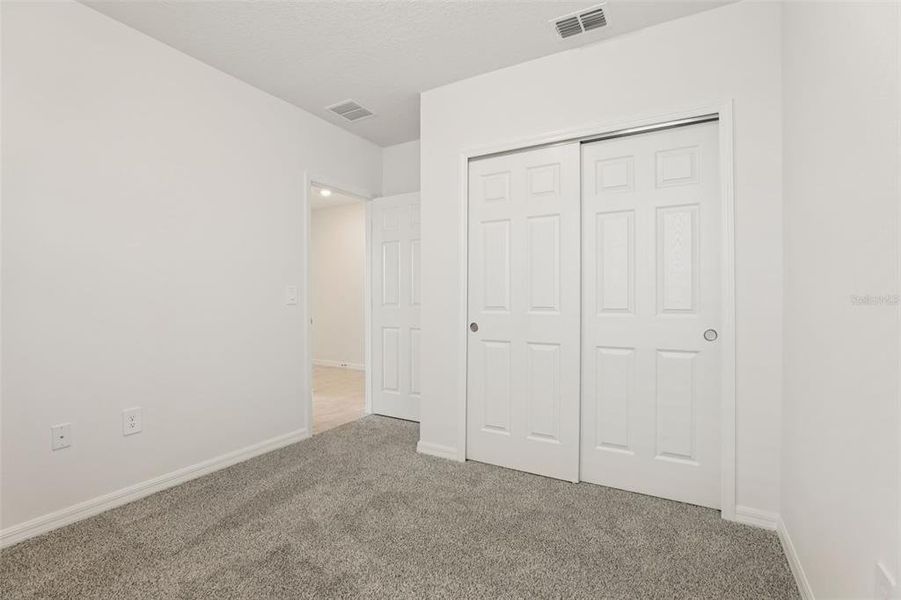 Spacious, unfurnished interior of a new home in Lawson Dunes - Signature Series, Haines City (Image 31).