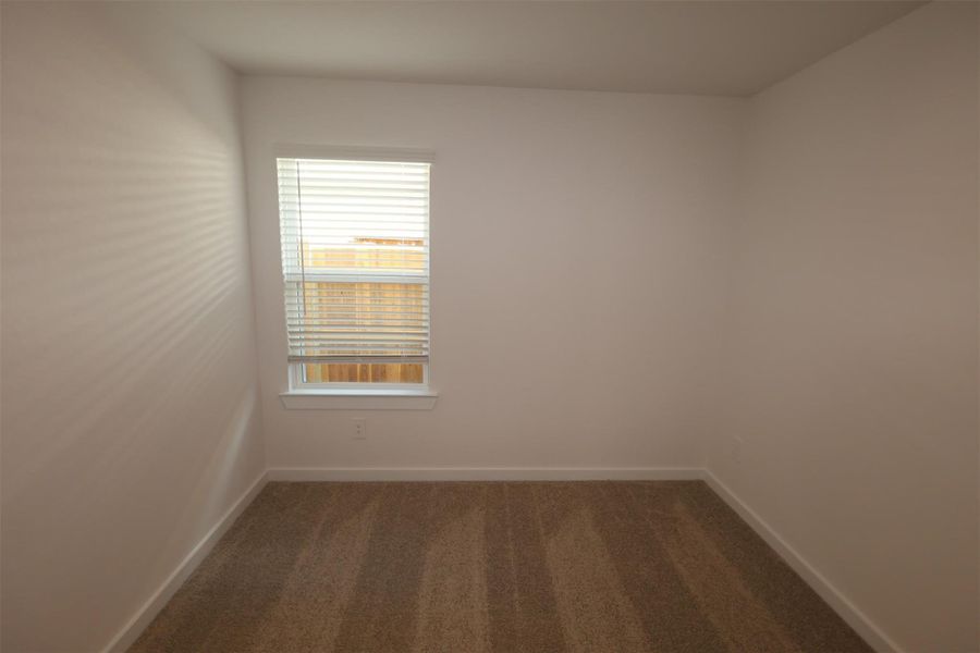 Spacious, unfurnished interior of a new home in Pinewood at Grand Texas, New Caney (Image 10).