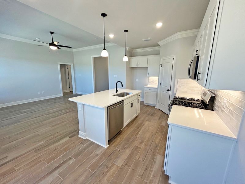 Furnished interior view inside a new home in The Bluffs at Lafayette, Freeport (Image 11).